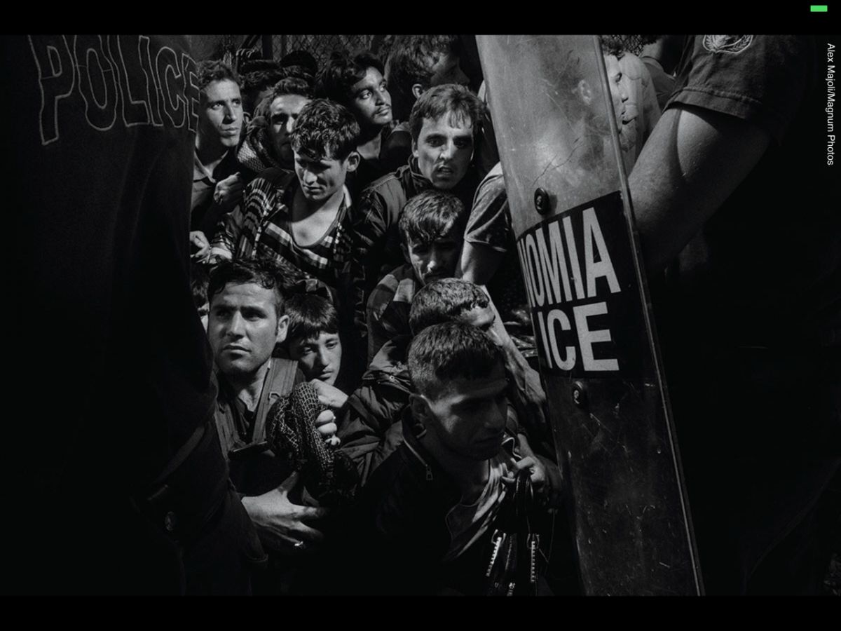 Refugees and migrants arriving on the island of Lesbos, in Greece, are transferred to Moria refugee camp to registration from authorities before they can move on, October 2015.