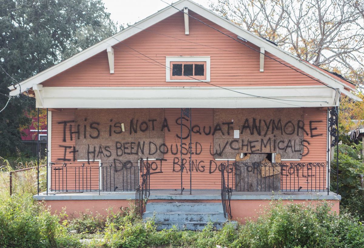 (NOT a) Squat house.